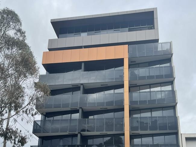 The apartment building on Burnley St in Richmond was locked down on Friday night. Picture: Twitter/@_StephAnderson