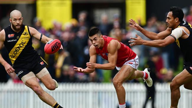  North's Jared Deep under pressure from Glenelg's Marlon Motlop last season. Picture: Tom Huntley