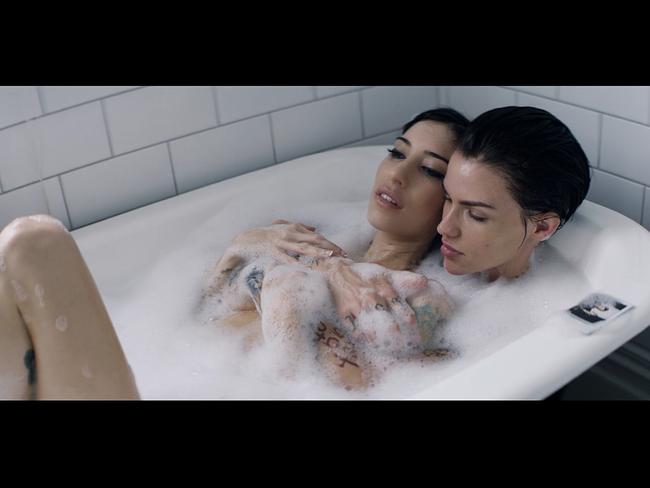 Ruby and Jess take a bath in a scene from the On Your Side video clip.