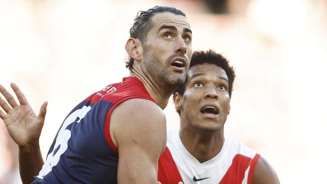 MELBOURNE, AUSTRALIA - APRIL 02: Joel Amartey of the Swans and Brodie Grundy of the Demons contest the ruck during the round three AFL match between Melbourne Demons and Sydney Swans at Melbourne Cricket Ground, on April 02, 2023, in Melbourne, Australia. (Photo by Daniel Pockett/Getty Images)