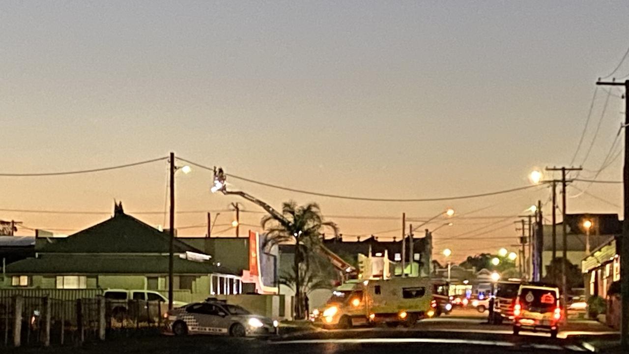 Warwick man (still) on roof.