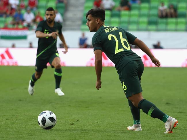 Australian teenager Daniel Arzani lines up what became a successful shot against Hungary that brought his first Socceroos goal.