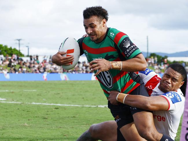 Souths' Isaiah Tass lunges for a try. Picture: Brendan Radke