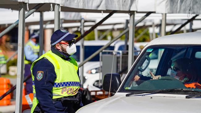 NSW police mans the Albury NSW border crossing. Picture: Simon Dallinger