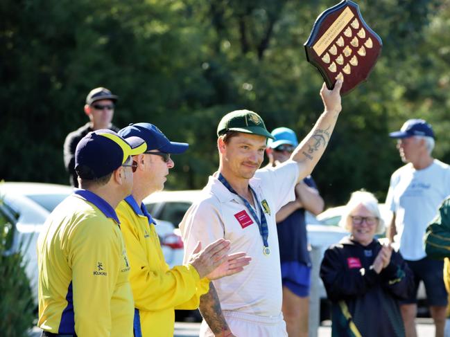 Tom McDermott shows off the Wright Shield.