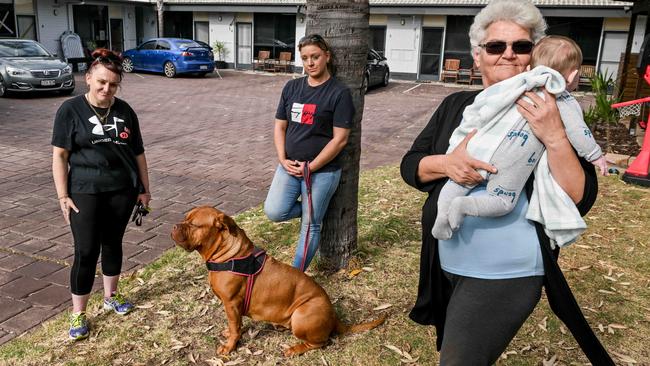 OCTOBER 23, 2024: Angie, Cass Richardson with her dog Armani and Rose Brahimi with her grandson she is raising are staying in the emergency accommodation at Port Noarlunga Motel. Picture: Brenton Edwards