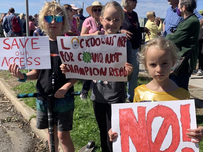 05/11/2022 Hundreds of residents gather at the Champion Rd rail crossing in Newport on Saturday to protest the State Government's planned closing of the crossing. These young people make their thoughts known on the planned closure of the Champion Rd rail crossing in Newport.