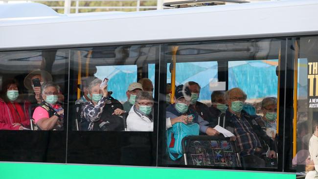 New Zealand passengers from the cruise ship Vasco da Gama are seen arriving at Perth airport on TransPerth buses to catch a direct flight back to New Zealand on Saturday. Picture: Colin Murty