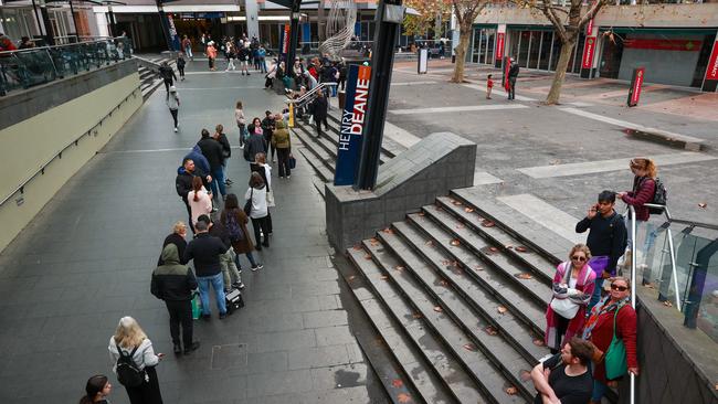 Those in the regions would rather take their chances with hours of travel and longer still in the queues than chance a postal passport delivery. Picture: Justin Lloyd