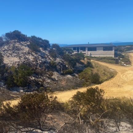 Aftermath of Dolphin Sands bushfire showing how close Harry Curry's property at 1010 Dolphin Sands Rd was to being consumed. Picture: Supplied