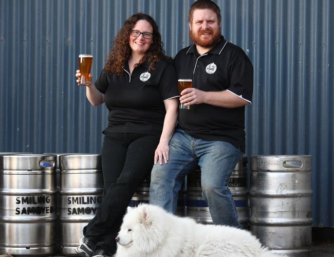 The opening of the Myponga Reservoir in April was great news for local business owners like Kate Henning, Simon Dunstone and Hoppy from the Smiling Samoyed Brewery. Picture: Tait Schmaal