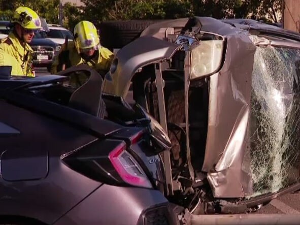 Police are searching for a hit and run driver who fled a crash at Kilkenny after her car rolled over. Picture: 9 News Adelaide