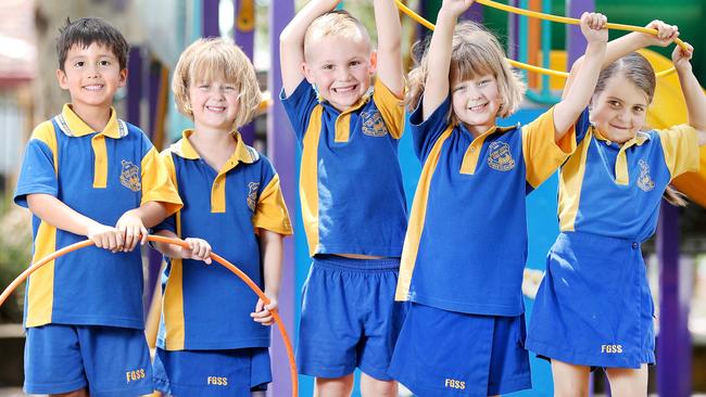 Ferny Grove State School prep students Seb Cairns, 6, Poppy Hoggett, 5, Tanner Chalker, 6, Matilda Hoggett, 5, and Shana Mohammad, 6 are thrilled to be finished school. Pics Tara Croser.