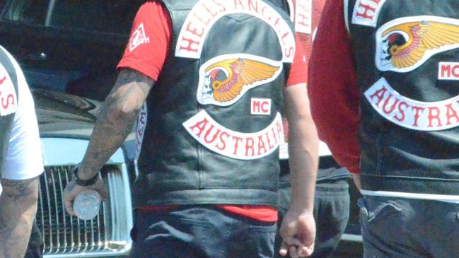 Police allege a Hells Angel bikie and an associate assaulted a man and left him in hospital for almost two months. (file photo)