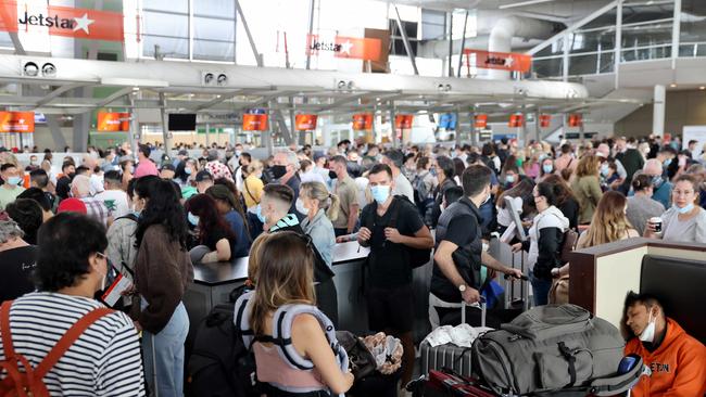 Sydney Airport is struggling to deal with crowds during its first major holiday period since Australia reopened its borders. Picture: NCA NewsWire / Damian Shaw