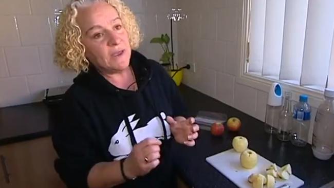 A screengrab showing mum Carmela Decarlo who found a pin in a pink lady apple. Picture: Seven Network