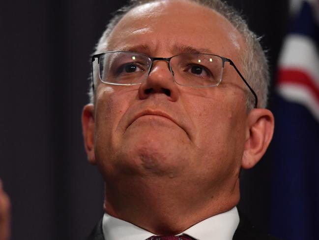 CANBERRA, AUSTRALIA - MARCH 23: Prime Minister Scott Morrison during a press conference at Parliament House on March 23, 2021 in Canberra, Australia. The federal government was yesterday set back by new allegationsÃÂ broadcastÃÂ by the Ten Network after pixelated images of unnamed Coalition advisers allegedly engaging in performing lewd sex acts on the desks of female MPs resulting in a Morrison staff member being sacked last night. Additionally, the ABC Network aired a first hand account by an Australian Parliament security guard of what she witnessed on the night Brittany Higgins was allegedly raped in the office of then-defence industry minister Linda Reynolds in early 2019. (Photo by Sam Mooy/Getty Images)