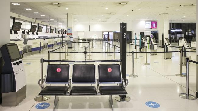 An empty Air New Zealand check-in desk at Sydney International Airport last month. Picture: Getty Images