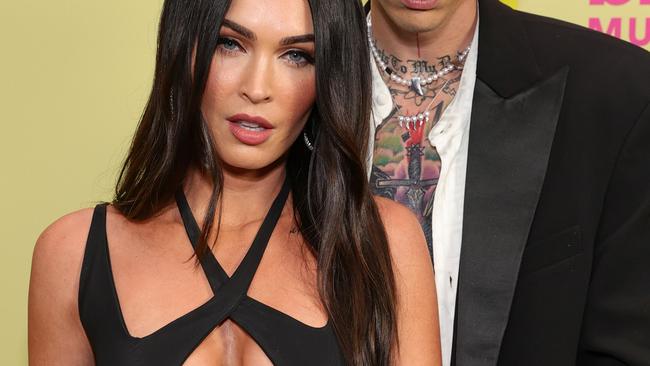 LOS ANGELES, CALIFORNIA - MAY 23: Machine Gun Kelly and Meghan Fox poses backstage for the 2021 Billboard Music Awards, broadcast on May 23, 2021 at Microsoft Theater in Los Angeles, California. (Photo by Rich Fury/Getty Images for dcp)