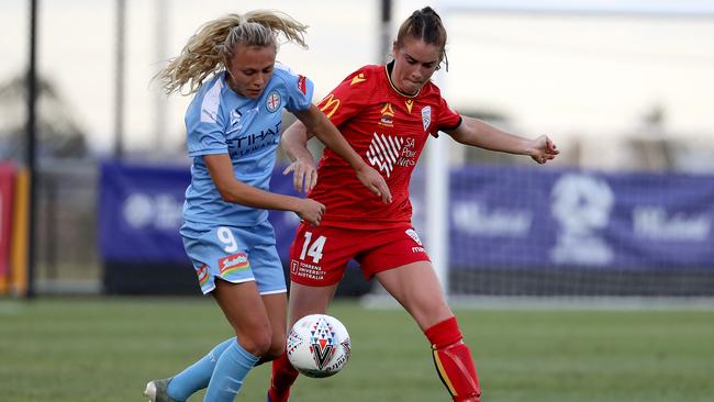 SHEPPARTON, AUSTRALIA - NOVEMBER 30: Claire Emslie of Melbourne City and Julia Ashley of Adelaide United in action during the round three W-League match between Melbourne City and Adelaide United at John McEwan Reserve on November 30, 2019 in Shepparton, Australia. (Photo by Jonathan DiMaggio/Getty Images)