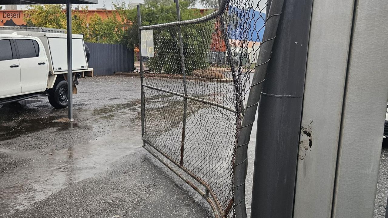 The front fence of Autocorrect smashed from the ram-raid.