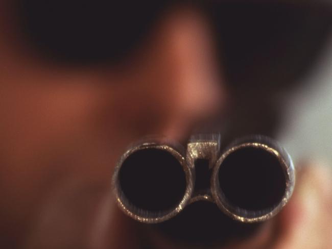 Generic image of barrels of a sawn-off shotgun pointing at camera.