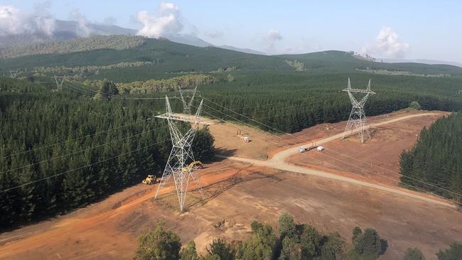 The proposed transmission towers and lines would be about 80 metres tall, and would contain more lines and be taller than existing pylons. Picture: Supplied