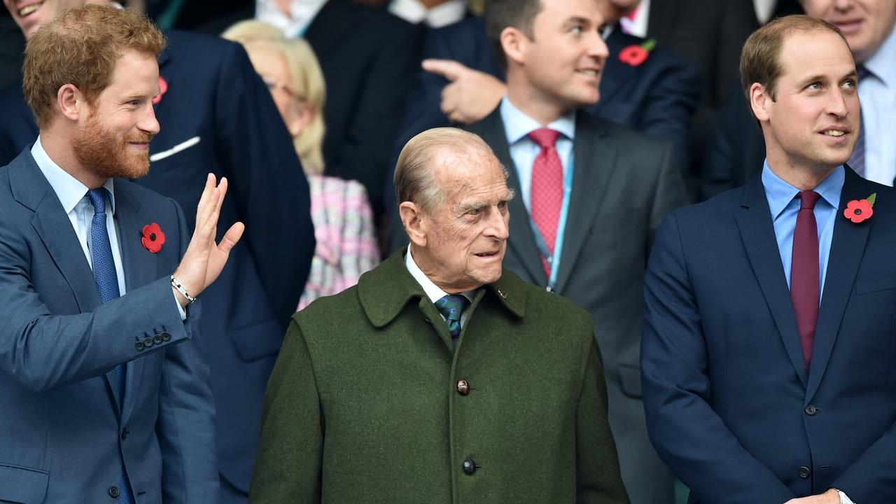 Prince Harry, Prince Philip and Prince William attend the 2015 Rugby World Cup Final match in October, 2015.