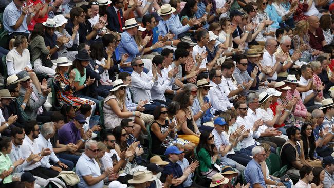 The centre court crowd watches the men's Singles Final match between Novak Djokovic of Serbia and Matteo Berrettini of Italy at Wimbledon in London. Picture: Getty