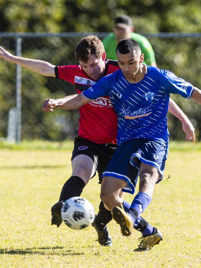 Jonty Calleja (left) of Chinchilla Bears and Rockville Rovers player Tahssin Al Qaso in Div 1 Men FQ Darling Downs Presidents Cup football at West Wanderers, Sunday, July 24, 2022. Picture: Kevin Farmer