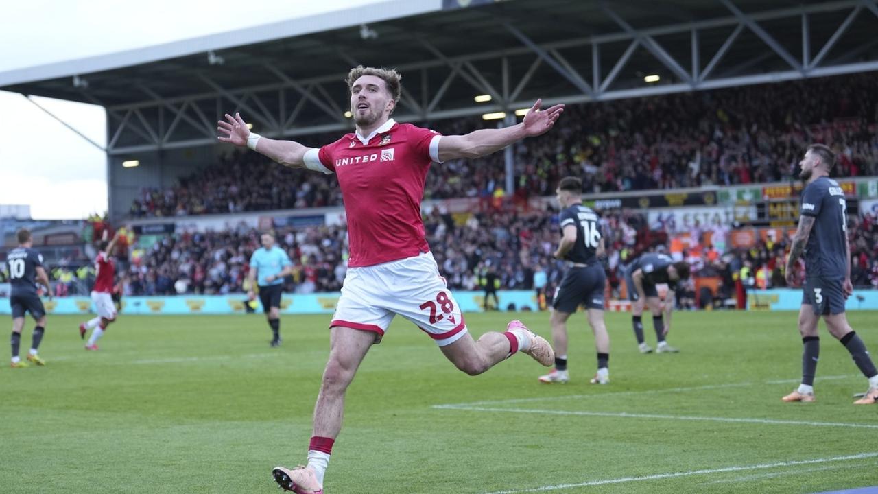 Wrexham's Sam Smith celebrates after scoring his side's third goal. Picture: AP Photo/Jon Super