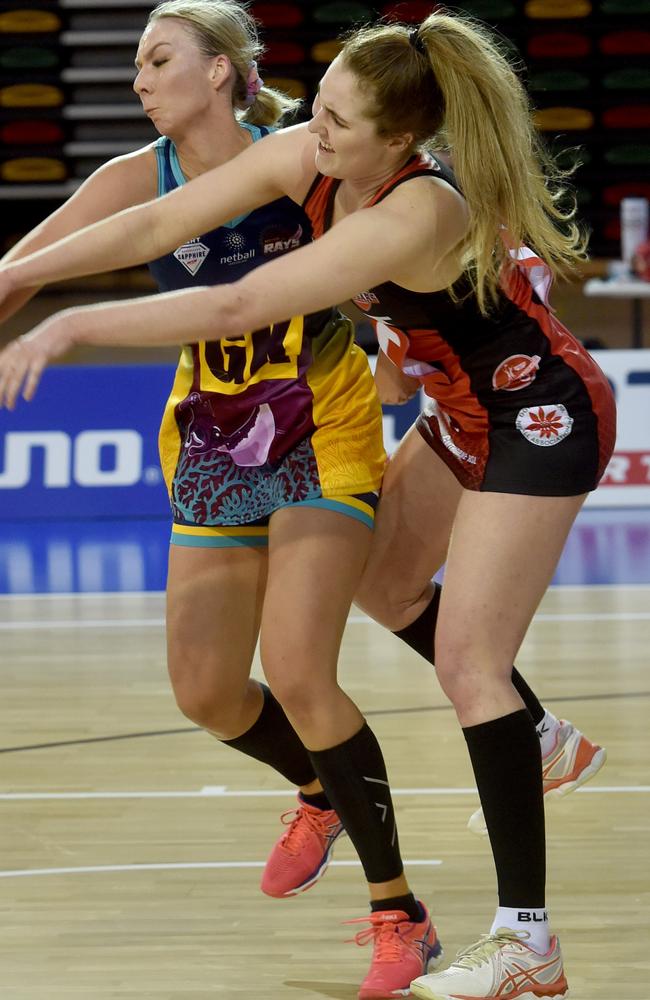 Sapphire Series Netball. Northern Rays against Brisbane North Cougars at Townsville Stadium. Rays Chloe Cooper and Cougars Mia Stower. Picture: Evan Morgan