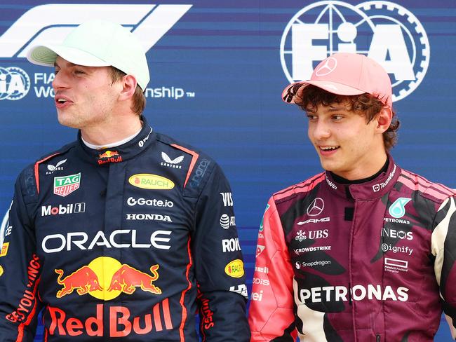 MIAMI, FLORIDA - MAY 03: Pole position qualifier Max Verstappen of the Netherlands and Oracle Red Bull Racing and Third placed qualifier Andrea Kimi Antonelli of Italy and Mercedes AMG Petronas F1 Team looks on during qualifying ahead of the F1 Grand Prix of Miami at Miami International Autodrome on May 03, 2025 in Miami, Florida.   Mark Thompson/Getty Images/AFP (Photo by Mark Thompson / GETTY IMAGES NORTH AMERICA / Getty Images via AFP)