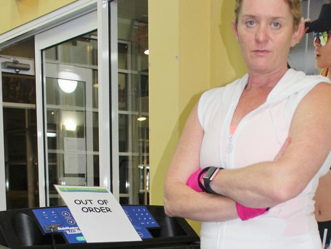 Sonja Rosier in front of a broken gym equipment.