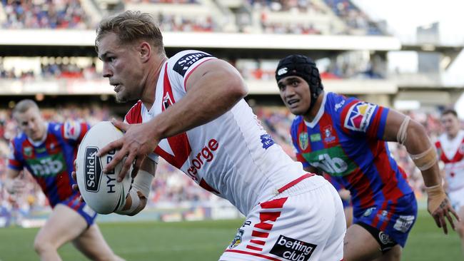 Jack de Belin makes a break during the Round 25 NRL match between the Dragons and Knights. Picture: AAP