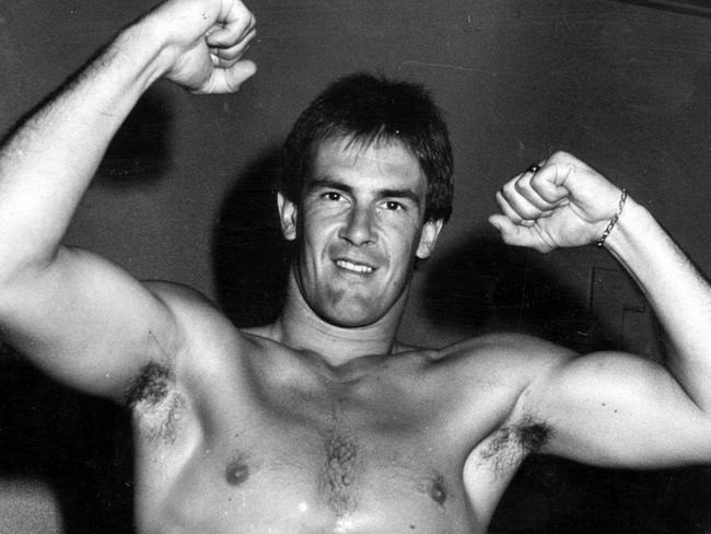 Hawks great Terry Wallace poses topless in 1985.