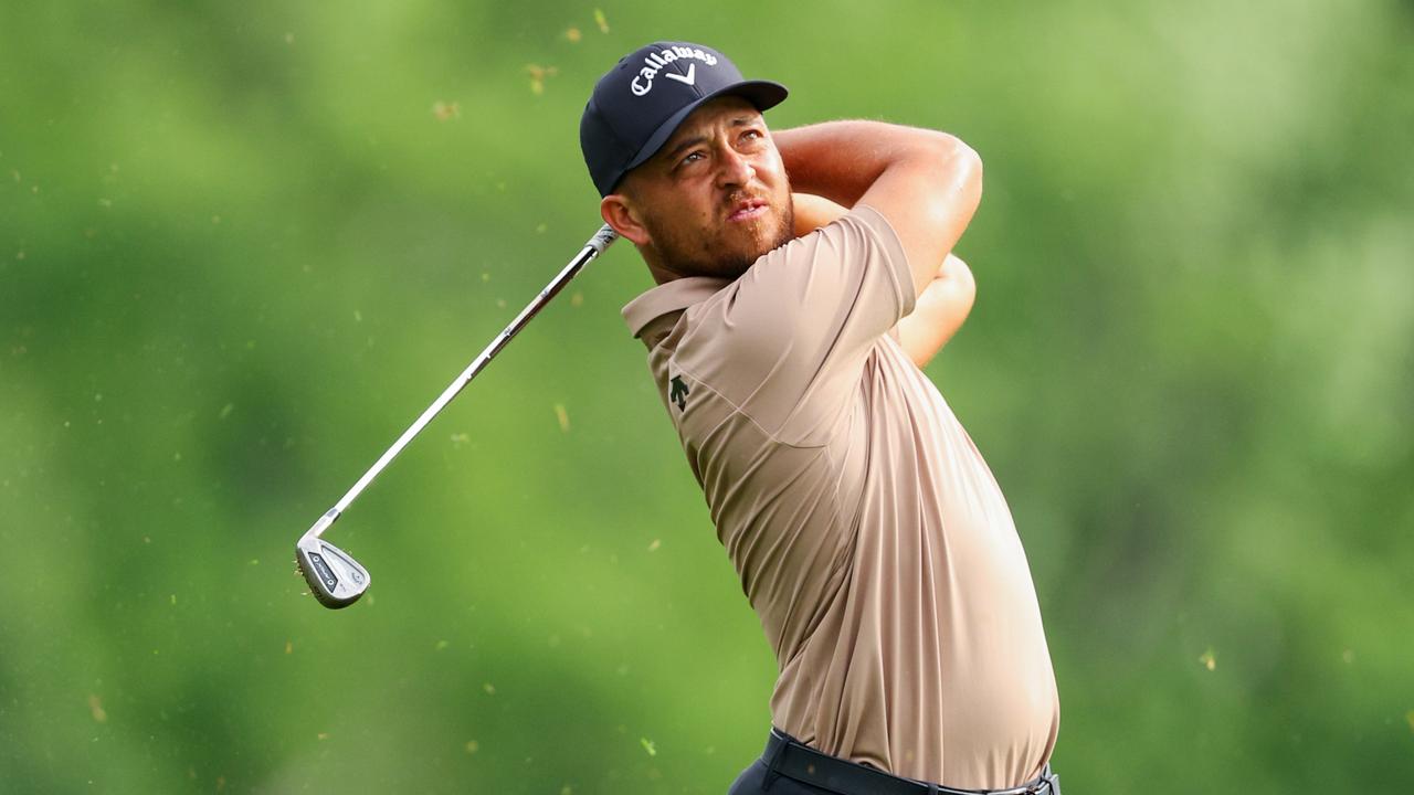 Xander Schauffele hits a shot. Photo by Andrew Redington/Getty Images