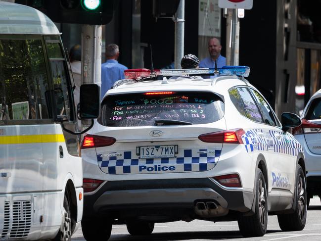 Police cars are plastered on William street in the city centre. Picture: Nadir Kinani