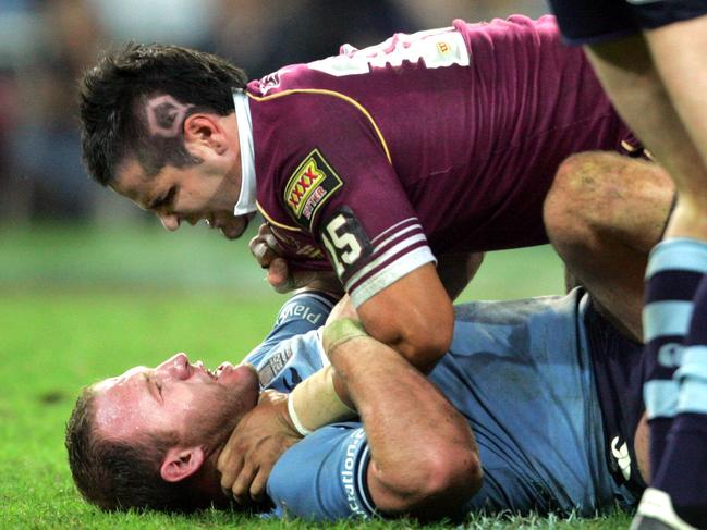 Webb, with the iconic Q shaves into his head, clashes with NSW’s Luke Bailey. Picture: Darren England