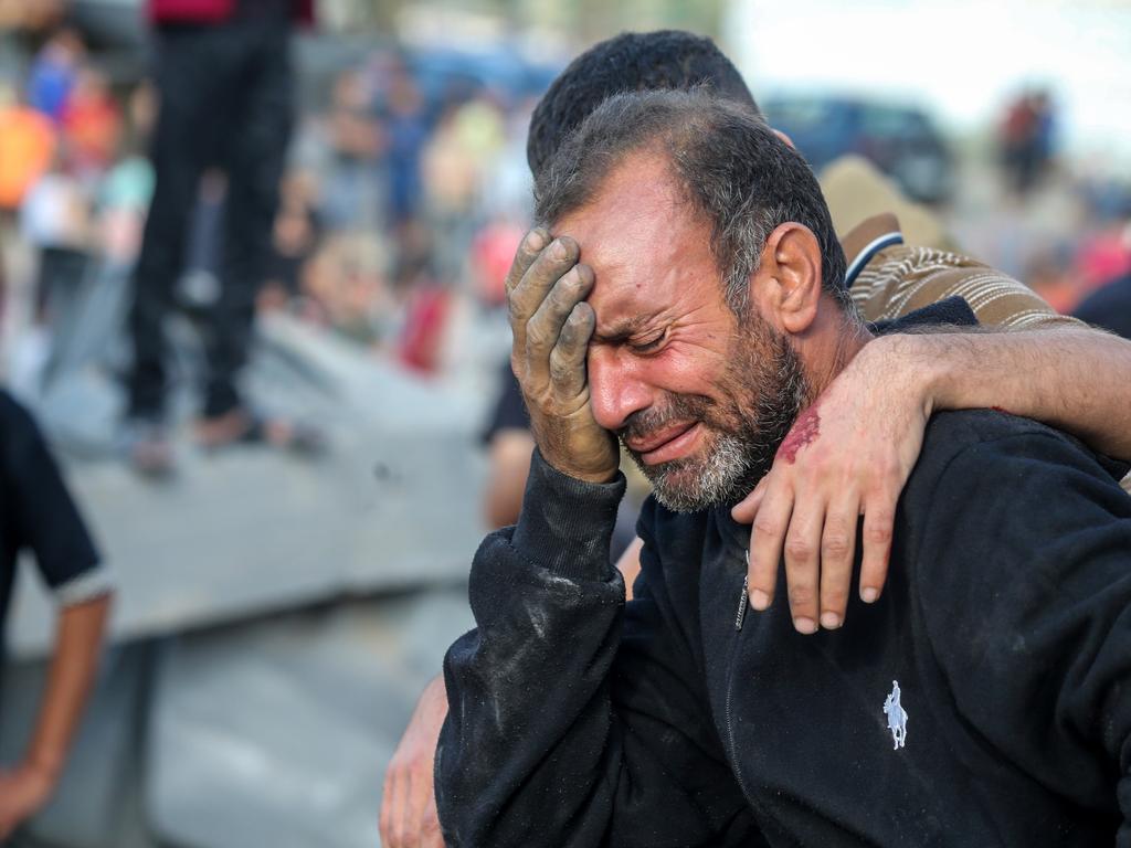 A devastated man after his home was bombed during Israeli raids in the southern Gaza Strip.