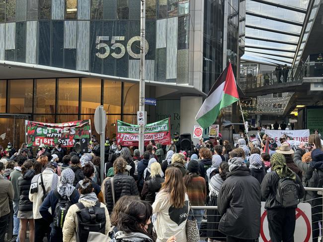 Protesters slam Hanwha, which once specialised in making explosives. Picture: Herald Sun