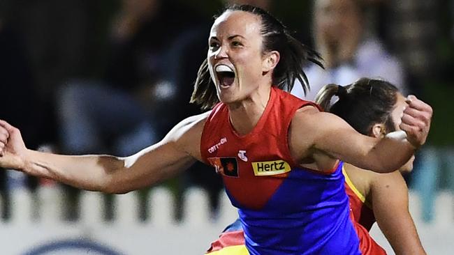 Daisy Pearce celebrates a goal as Melbourne proved too strong for Adelaide in their grand final rematch at Glenelg Oval. Picture: Mark Brake/Getty Images