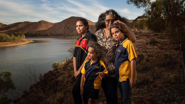 Annette Wilton with Kalina, 16, Chendelle, 4, and Phoneeque, 7, at Aroma Dam. Picture: Brad Fleet