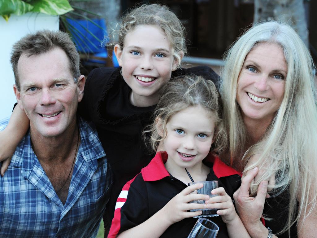 Heartbroken parents Dave, left, and Danny, right, had to move forward with hope for Billie’s big sister Charlie, back centre. Picture: supplied