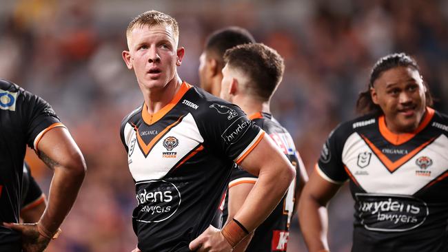 SYDNEY, AUSTRALIA - MARCH 12:  Alex Seyfarth  of the Tigers looks dejected after a try during the round one NRL match between the Wests Tigers and the Melbourne Storm at CommBank Stadium, on March 12, 2022, in Sydney, Australia. (Photo by Mark Kolbe/Getty Images)