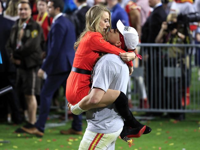 MIAMI, FLORIDA - FEBRUARY 02: Patrick Mahomes #15 of the Kansas City Chiefs celebrates with his girlfriend, Brittany Matthews, after defeating the San Francisco 49ers 31-20 in Super Bowl LIV at Hard Rock Stadium on February 02, 2020 in Miami, Florida. (Photo by Andy Lyons/Getty Images)