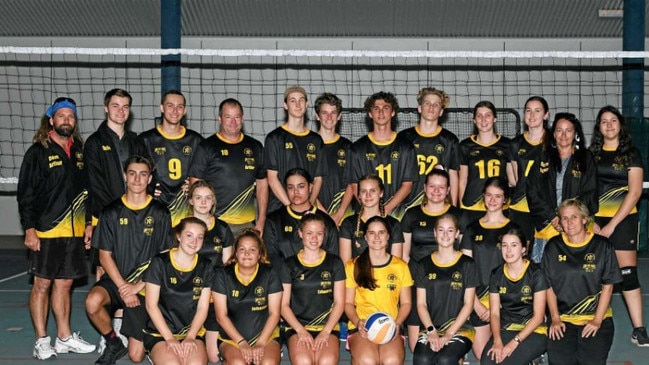 Dave Arthur (back left) coaching the James Nash State High School volleyball team.