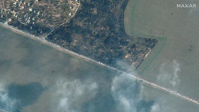 This handout picture taken and released by Maxar satelitte image on March 18, 2022 shows a part of a long line of cars with people evacuating from Mariupol, southeastern of Ukraine. Picture: AFP