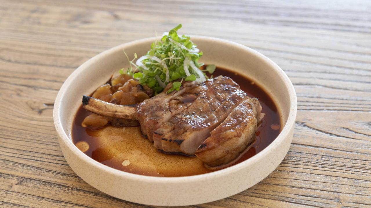 Mastery of the grill: Pork loin chop at Manly Boathouse. Picture: Mark Cranitch.