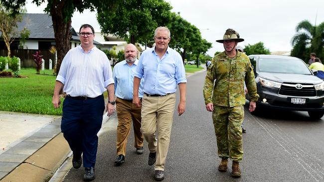 Prime Minister of Australia Scott Morrison visits Idalia in Townsville to survey the aftermath of the floods in 2019. Pictured with George Christensen MP and Brigadier Scott Winter. Picture: Alix Sweeney